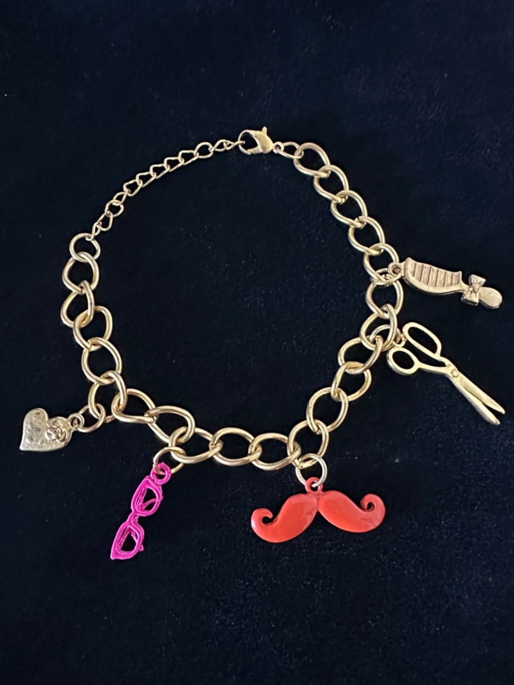 Gold-Tone Charm Bracelet with Pink and Red Accents